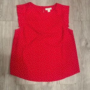 Red top with white polka dots
